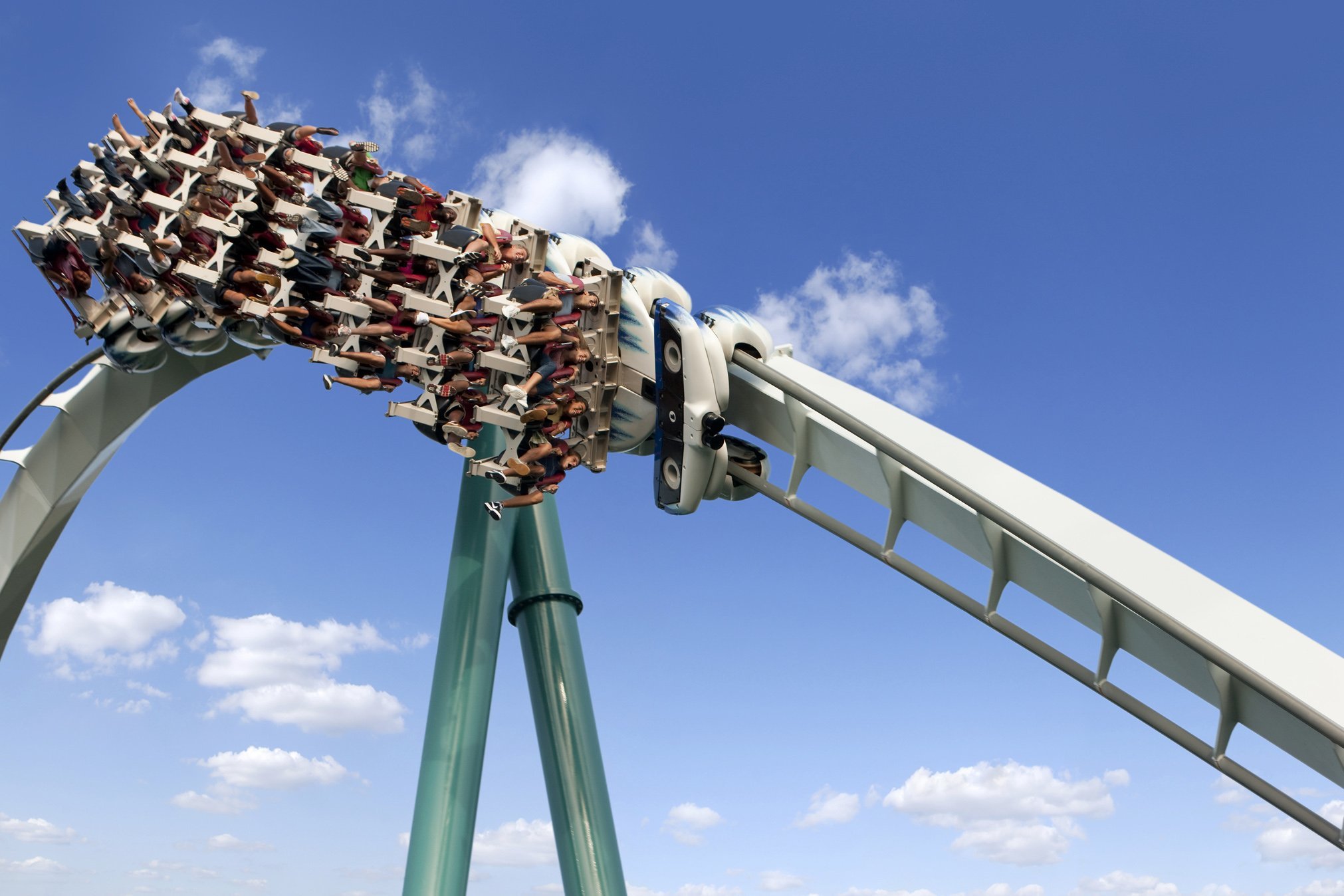 Teal and white upside down roller coaster