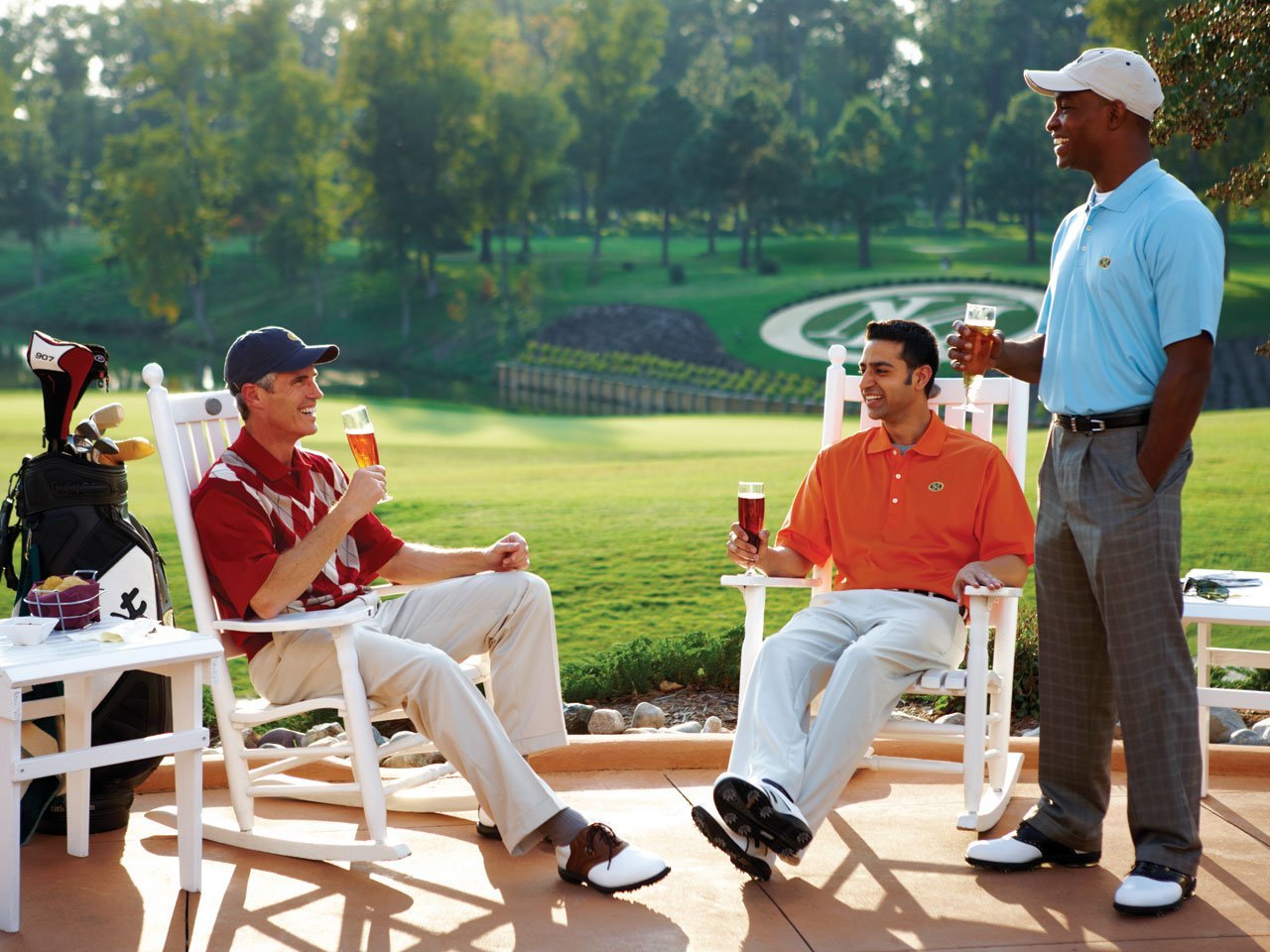 Golfers relaxing with beer