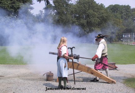 A man and woman firing the Swivel Gun