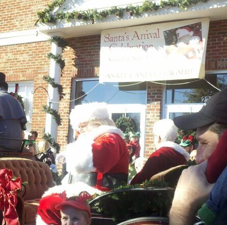 Santa on a buggy riding through town