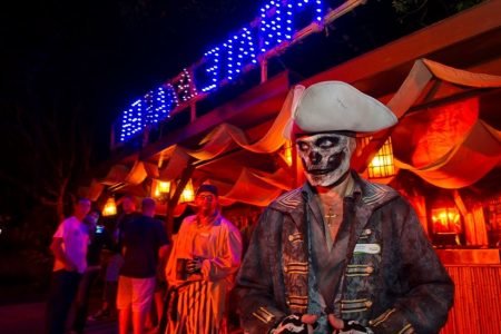 A man dressed in a pirate skeleton costume at Howl O Scream