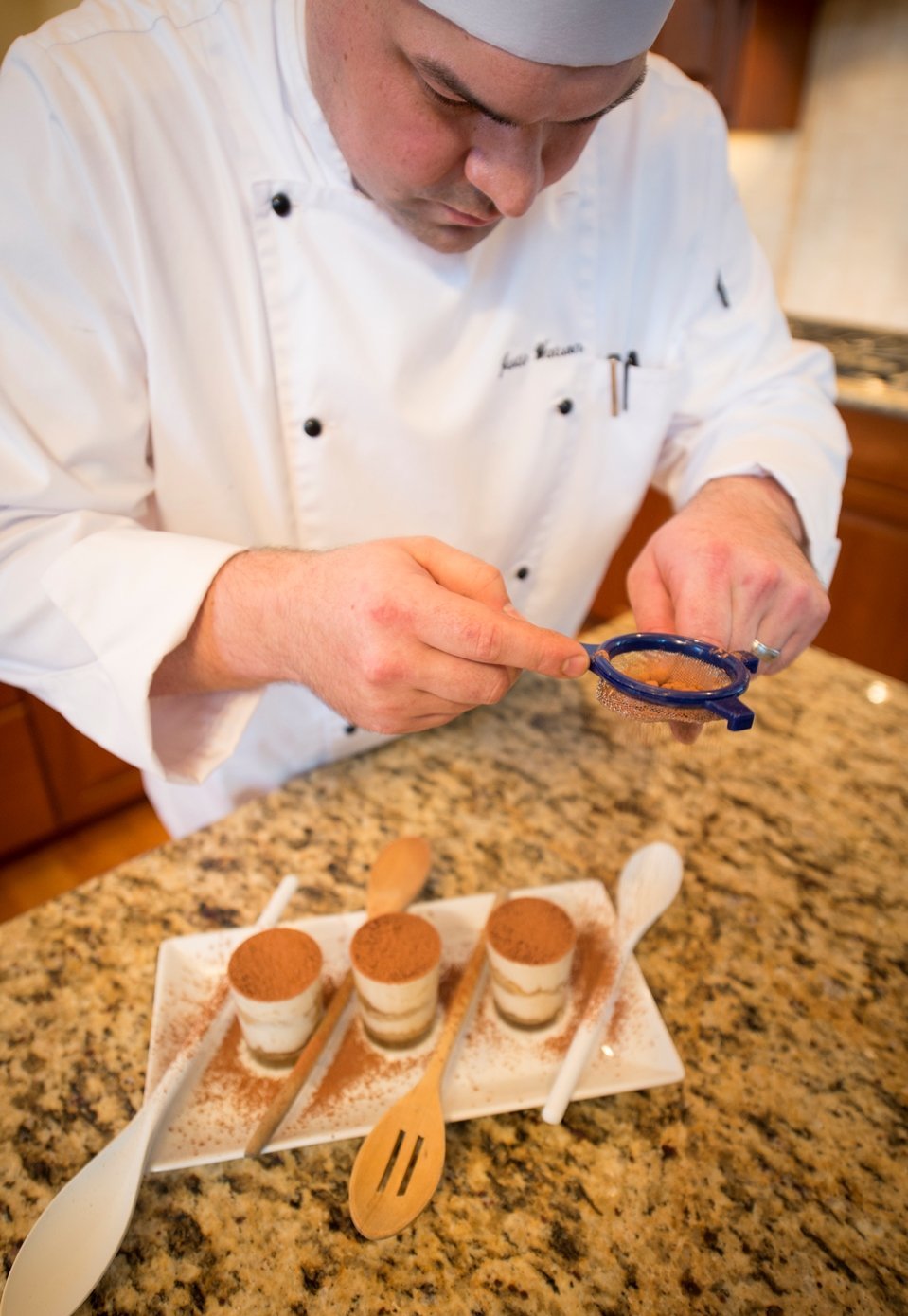 A Chef prepares desserts for the Festival